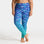Blue patterned swim leggings worn by a person on a white background